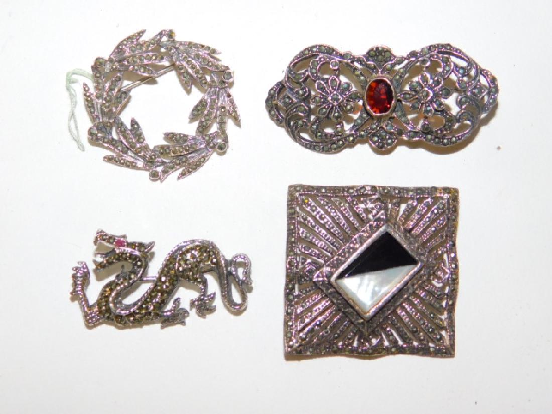 FOUR STERLING SILVER PINS (1 of 1)