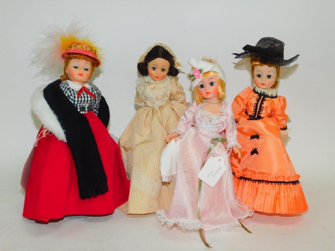COLLECTION OF DOLLS: 4 TOTAL. NO BOXES. WITH STANDS