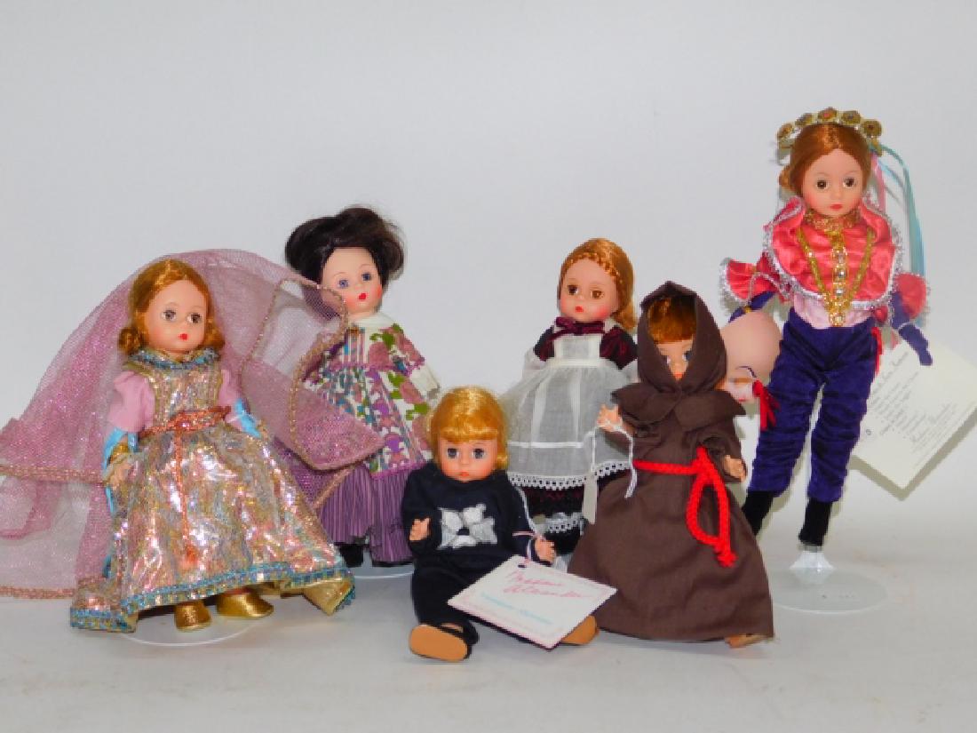 COLLECTION OF DOLLS: 6 TOTAL. NO BOXES. ALL BUT ONE HAS STAND.
