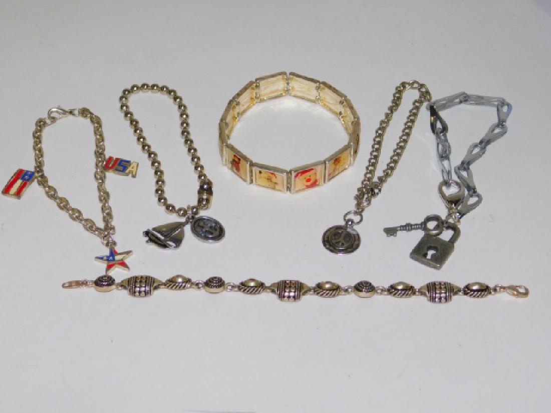 SIX COSTUME BRACELETS (1 of 3)