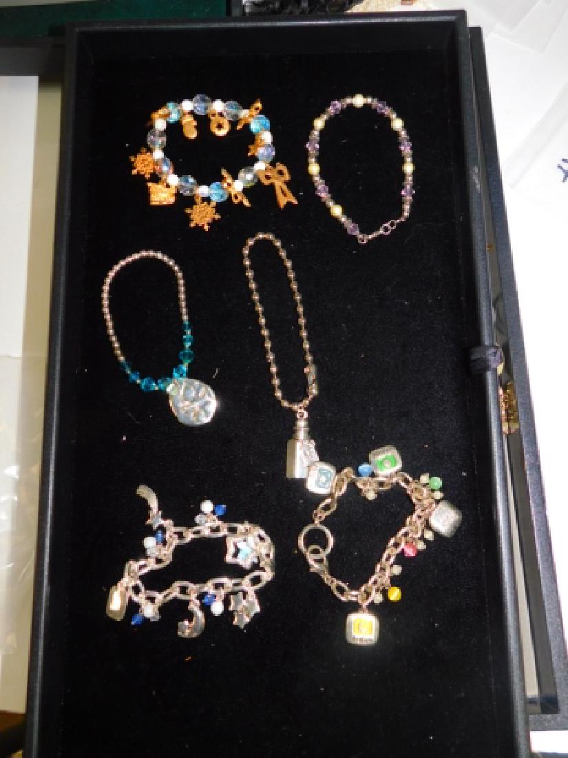 SIX COSTUME BRACELETS (1 of 1)