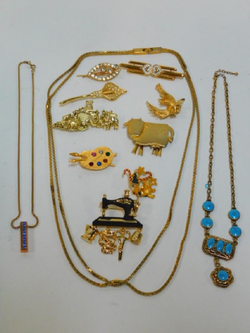 COLLECTION OF COSTUME JEWELRY: NECKLACES AND PINS.
