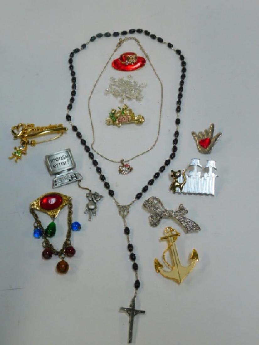 COLLECTION OF COSTUME JEWELRY: NECKLACES, PINS, AND BRACELETS