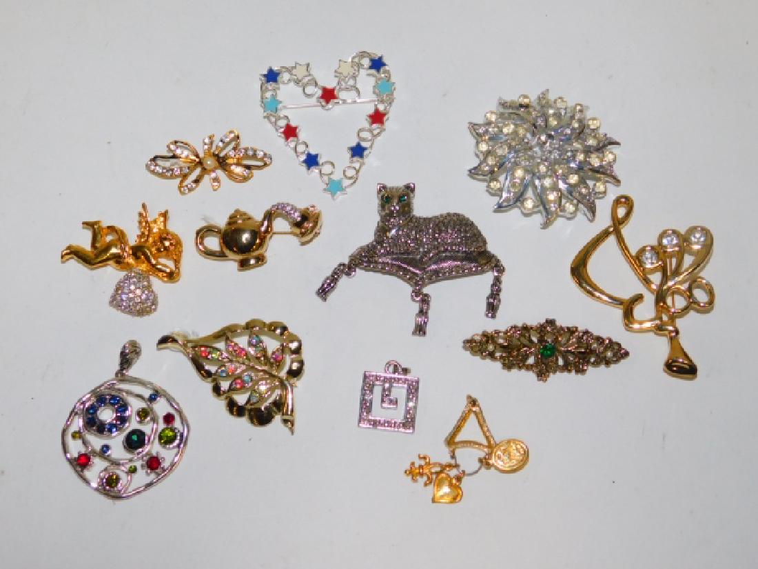 COLLECTION OF COSTUME JEWELRY: GORGEOUS VAREITY OF COSTUME PINS AND PENDANTS. MANY GREAT FOR ANY DAY WEAR