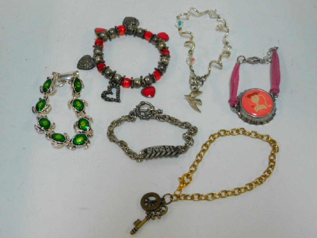 SIX COSTUME BRACELETS (1 of 1)