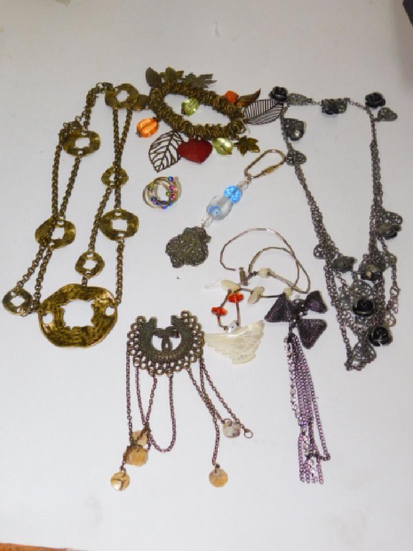 COLLECTION OF COSTUME JEWELRY: UNIQUE VARIETY OF COSTUME JEWELRY. NECKLACES BRACELETS AND MORE