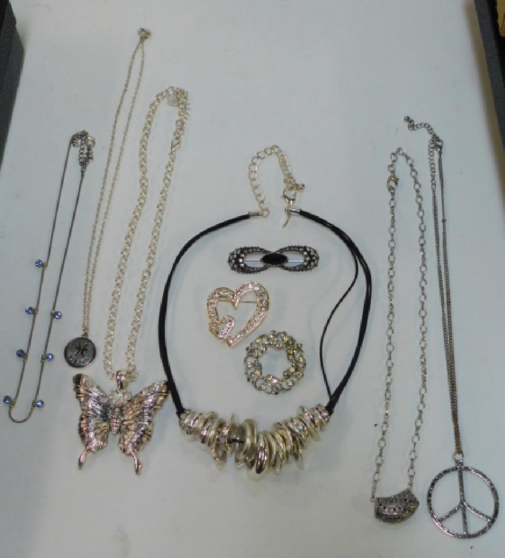 COLLECTION OF COSTUME JEWELRY: BEAUTIFUL COLLECTION OF COSTUME NECKLACES ND PINS.