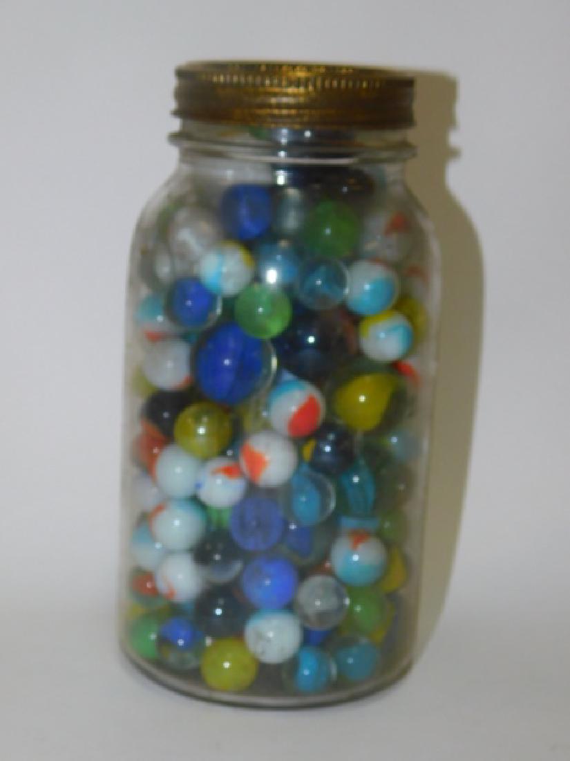 JAR OF MARBLES: VARIETY OF MARBLES