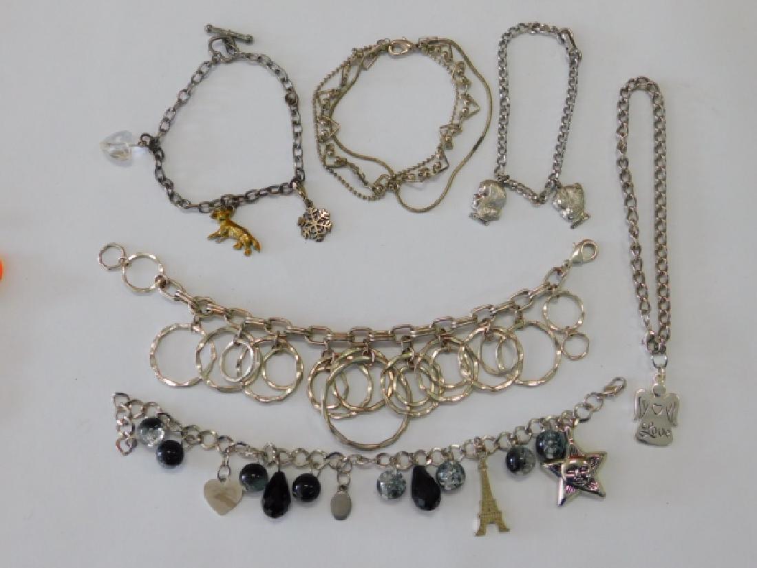 SIX COSTUME BRACELETS. (1 of 1)