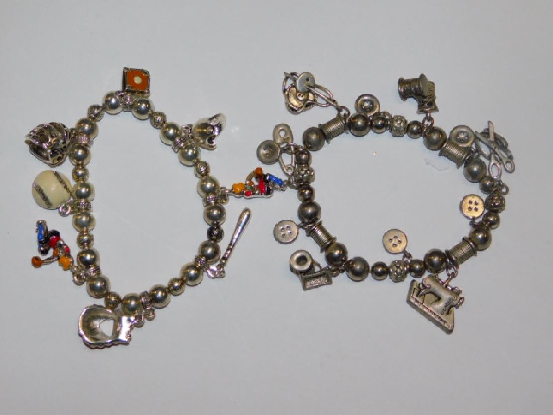 TWO COSTUME CHARM BRACELETS: TWO NICE CHARM BRACELETS