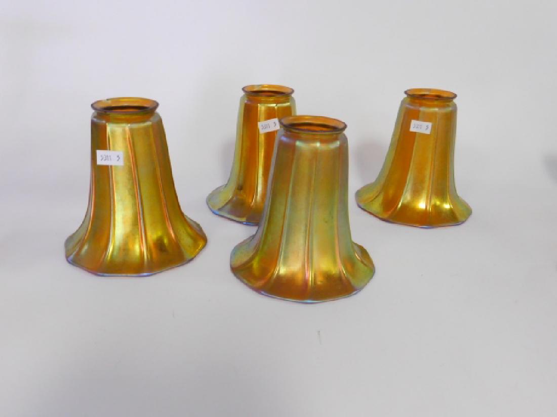 SET 4 STEUBEN SHADES: 2 WITH RIM CHIPS, ALL ARE STAMPED STEUBEN, 2.25" FITTING, SHADE 5.5 INCHES LONG. GOOD CONDITION