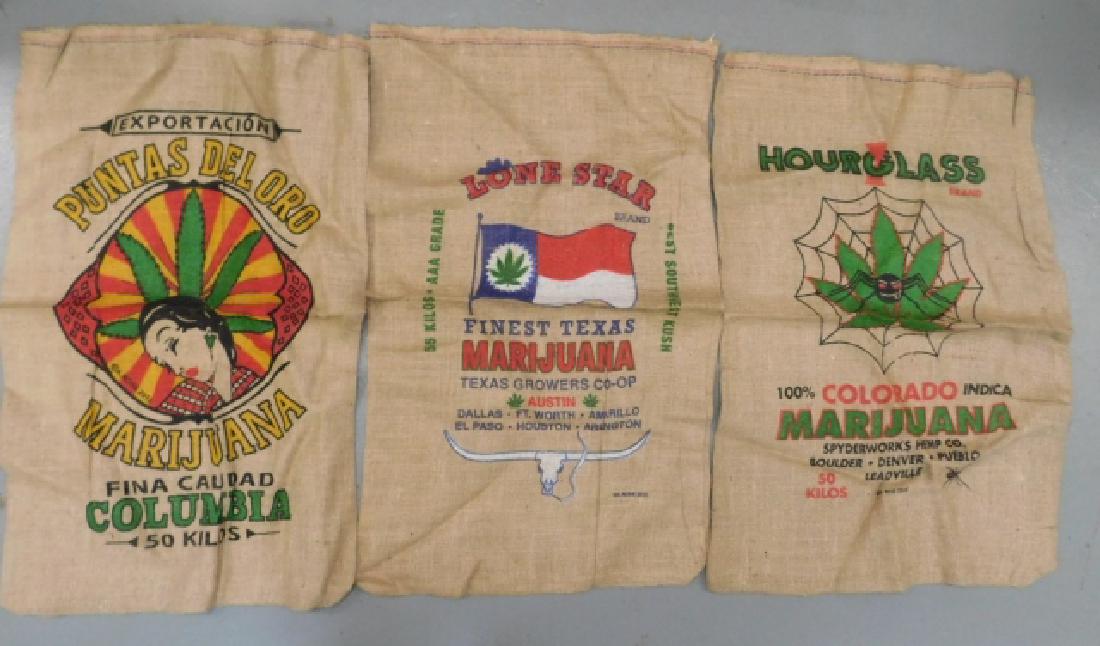 THREE MARIJUANA BURLAP SACKS: APPROX 2' FEET LONG. CLEAN CONDITION