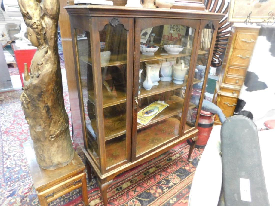 OAK CHINA CABINET: FITTED WITH THREE SHELVES. GLASS SIDES AND DOORS. 43" LONG, 62" TALL, 13" DEEP. REAL NICE, CLEAN, QUEEN ANNE. ALL ORIGINAL FINISH