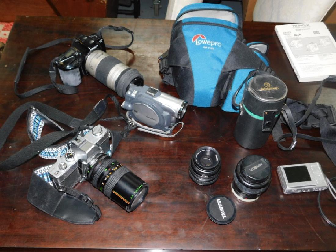 COLLECTION OF CAMERAS AND CAMERA GEAR: MINOLTA CAMERAS AND LENSES. PLUS MORE.