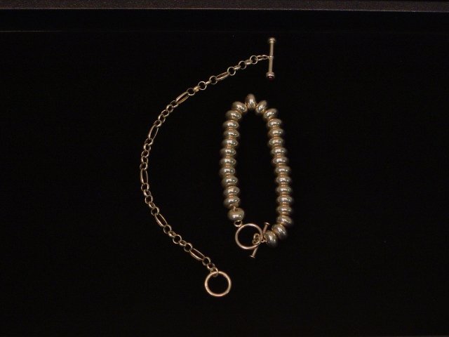 2 Sterling Bracelets: 1 with sterling beads
