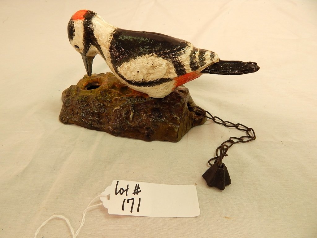 cast iron door knocker: reproduction cast iron woodpecker door knocker