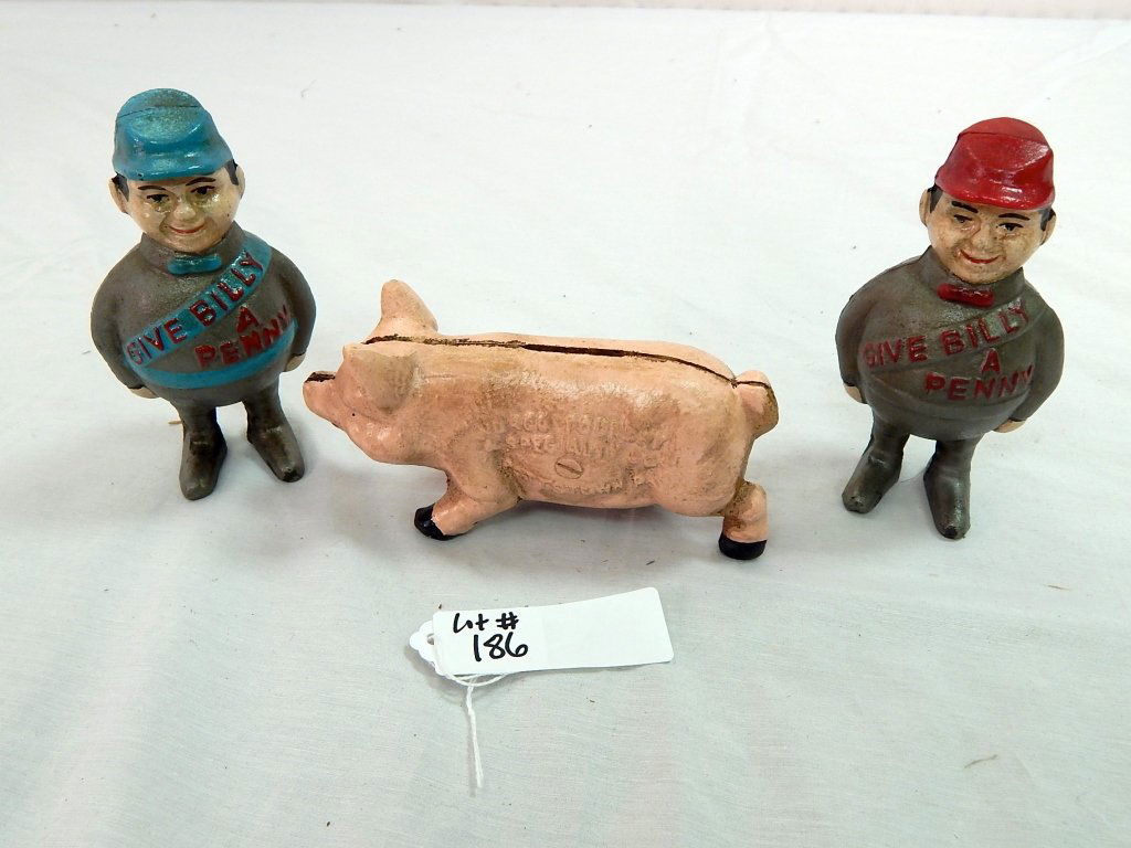 reproduction cast iron banks: comprised of three cast iron banks, including pig bank