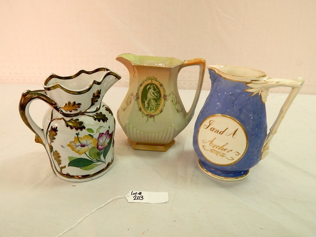 collection of three pitchers: comprised of three iron stone pitchers