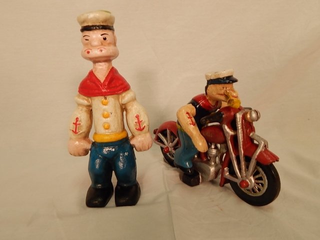 PAIR OF CAST IRON POPEYE BANKS