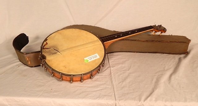 BANJO: back torn, as is