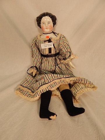 POST CIVIL WAR CHINA DOLL: 24" doll with leather body, black hair and blue eyes