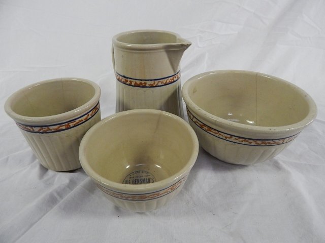 4 RED WING STONEWARE BOWLS AND PITCHER: WITH ADVERTISING. CRACKS AND CHIPS, AS IS