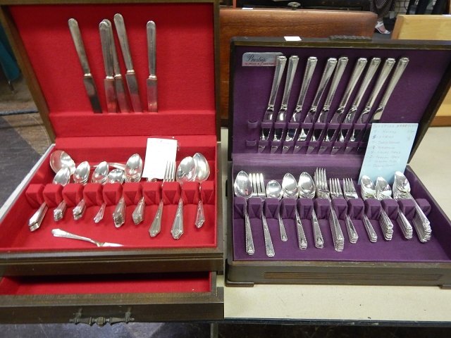 2 SILVER PLATE SETS: ONE IS PRESTIGE. ONE IS TUDOR.