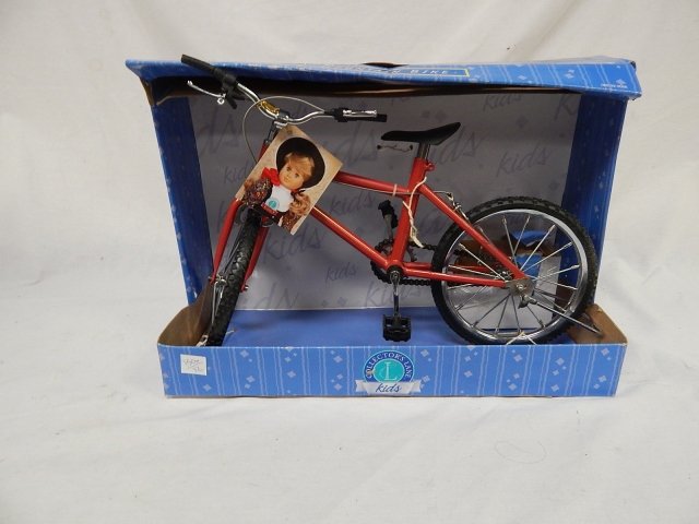 MOUNTAIN BIKE TOY IN BOX: PERFECT CONDITION. 12" TALL, 18" LONG.