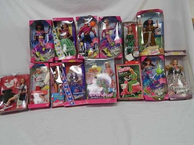 13 BARBIES: BOXES ARE DAMAGED. SOME DUPLICATES. NATIVE AMERICAN BARBIE, POLYNESIAN BARBIE, HOT SKATING BARBIE, CAR.