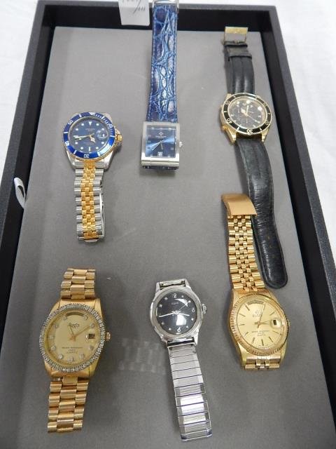 LOT OF SIX WATCHES: ELGIN, REGIS, GRUEN, PATEK PHILLIPPE (POSSIBLE REPRODUCTION), BULOVA. SOLD AS IS.