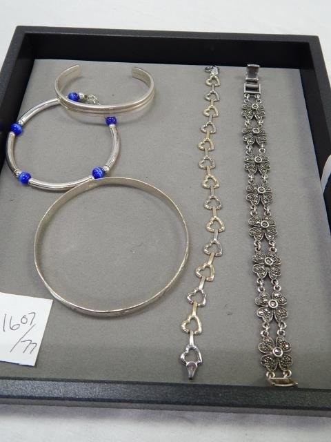 FIVE STERLING SILVER BRACELETS: MARCASITE, MULTI COLORED STONES.