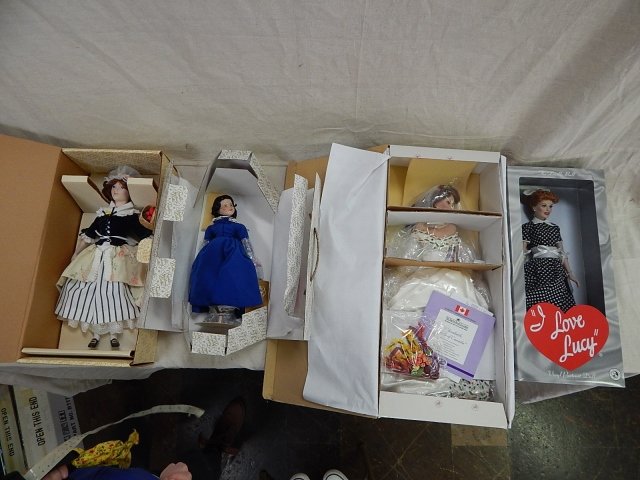 4 ASSORTED DOLLS: ASHTON DRAKE ELIZABETH PRIDE OF CANADA, I LOVE LUCY, AND TWO FRANKLIN HEIRLOOM DOLLS.