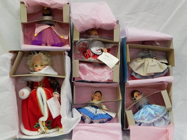 SIX MADAME ALEXANDER DOLLS: 7" TALL. MEG'S BALLGOWN, COLUMBINE, MAMMY, COCA COLA, BOHEMIA, AND MRS. CLAUS.