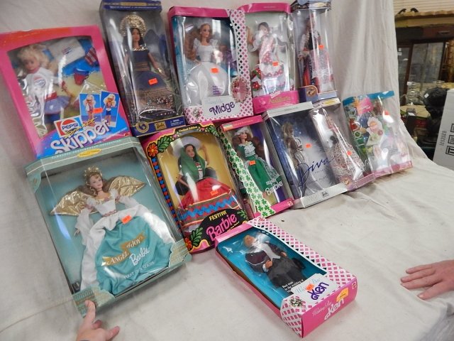 12 BARBIES: ANGEL OF JOY, PRINCESS OF THE INCAS, IRISH, AUSTRIAN, AND POLISH BARBIES AND MORE.