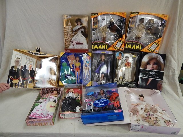 12 ASSORTED DOLLS: 35th ANNIVERSARY MIDGE, TALK OF THE TOWN BARBIE, WINDSOR CLASSIC BARBIE, ANTIQUE ROSE BARBIE, IMANI BARBIE, ELVIS AND MORE.