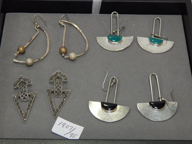 FOUR PAIRS OF STERLING SILVER EARRINGS: MARCASITE AND ONYX STONES.