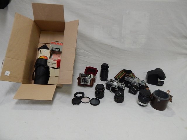 COLLECTION OF CAMERA AND CAMERA GEAR: WHITTNAUER FUJICA AND TOPCON. CONDITION IS UNKNOWN. LENS, CAMERA ALL SOLD AS IS.