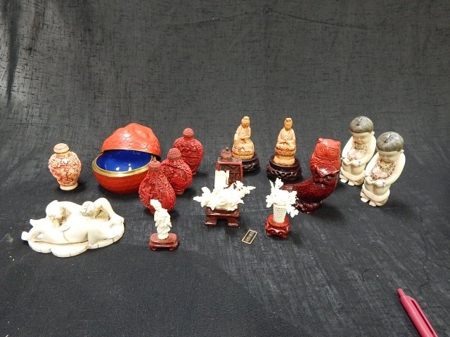 COLLECTION OF ORIENTAL FIGURES: CINNEBAR AND COMPOSITION.