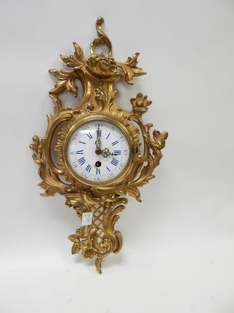 FRENCH BRONZE WALL CLOCK: 20" TALL, NO BEZEL, PORCELAIN DIAL HAS CHIP. FORESTVILLE CLOCK COMPANY. MADE IN GERMANY. NO KEY, SOLD AS IS.