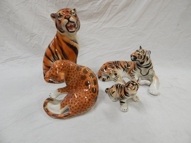 FOUR FIGURINES OF BIG CATS: SIGNED MADE IN USSR AND RUSSIA. TALLEST IS 13".