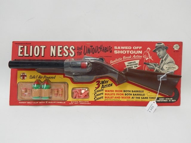 TOY ELIOT NESS AND THE UNTOUCHABLES SHOT GUN: IN ORIGINAL PACKAGING. CONDITION AS SHOWN.