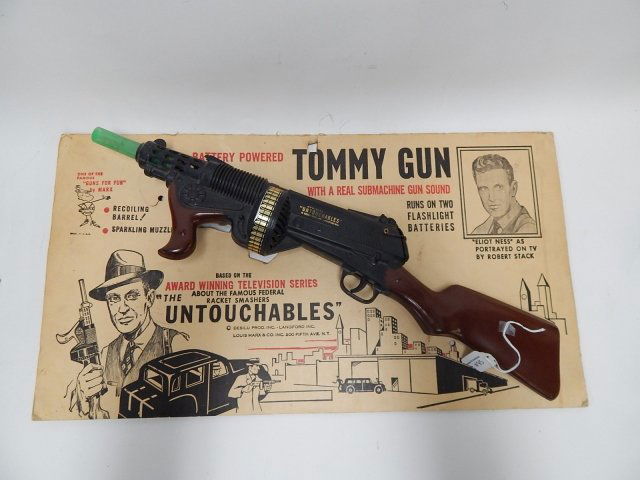 TOY UNTOUCHABLES BATTERY POWERED TOMMIE GUN: CONDITION AS SHOWN.