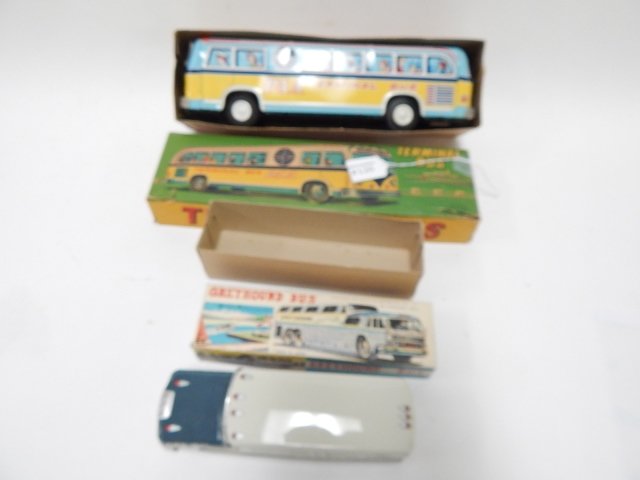 PAN AM TERMINAL BUS AND GREYHOUND BUS WITH BOXES: CONDITION AS SHOWN.