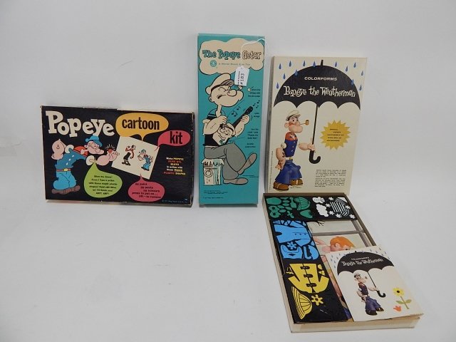 CARTOON POP EYE PAINT SETS AND A POPEYE GUITAR: CONDITION AS SHOWN.