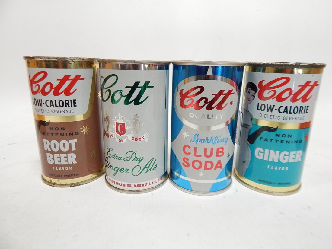FOUR COTT SODA CANS: CONDITION AS SHOWN.