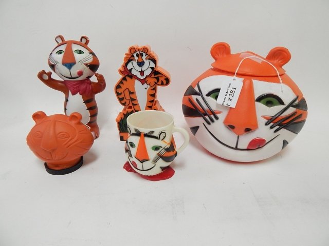 TONY THE TIGER COLLECTION: COOKIE JAR, SOAP BOTTLE, CUP, RADIO, KELLOGG'S CO. RADIO. CONDITION AS SHOWN.