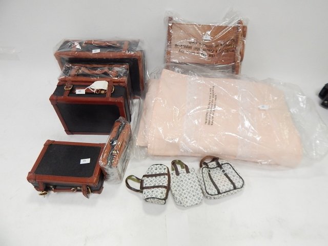DOLL BED AND SET OF DOLL LUGGAGE: FIVE SUIT CASES. BED NEEDS TO BE ASSEMBLED.
