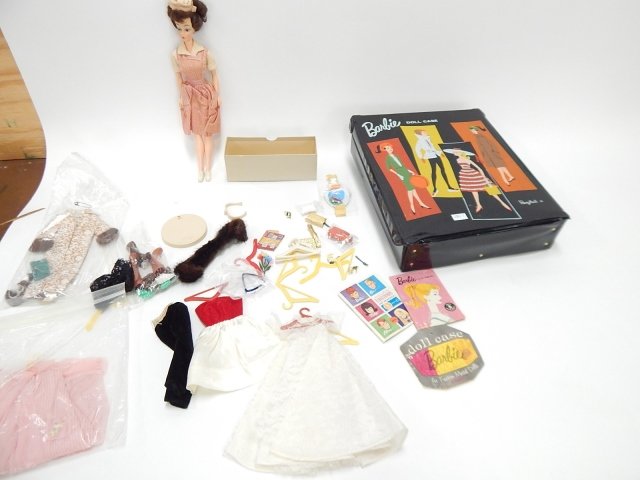 BARBIE DOLL SET: A DOLL, CASE, AND ACCESSORIES.