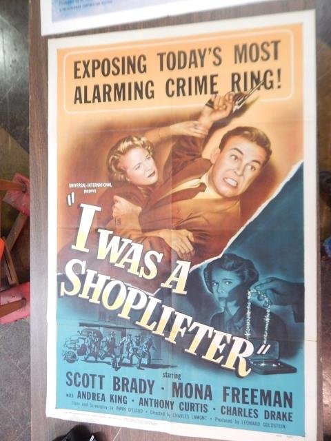 2 MOVIE POSTERS: TRUCKIN MAN, I WAS A SHOPLIFTER. FOLDS AND SMALL TEARS IN PAPER, PIN MARKS IN CORNERS