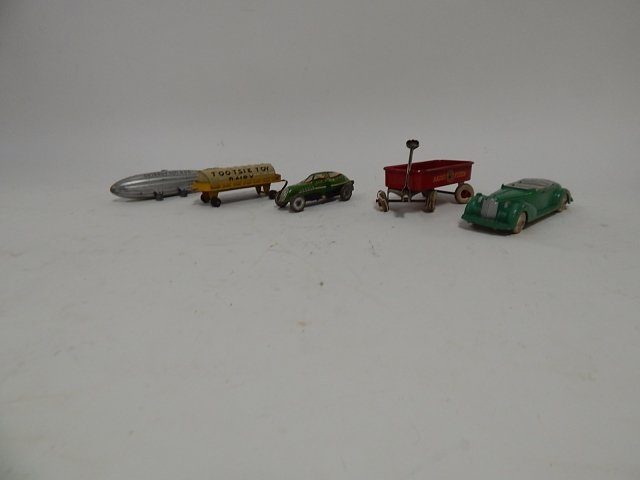 COLLECTION OF MINIATURE TIN TOYS: HUBLY, MARX, TOOTSIE. SOLD AS IS.